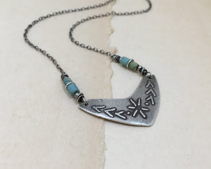 Tribal style beaded boomerang necklace