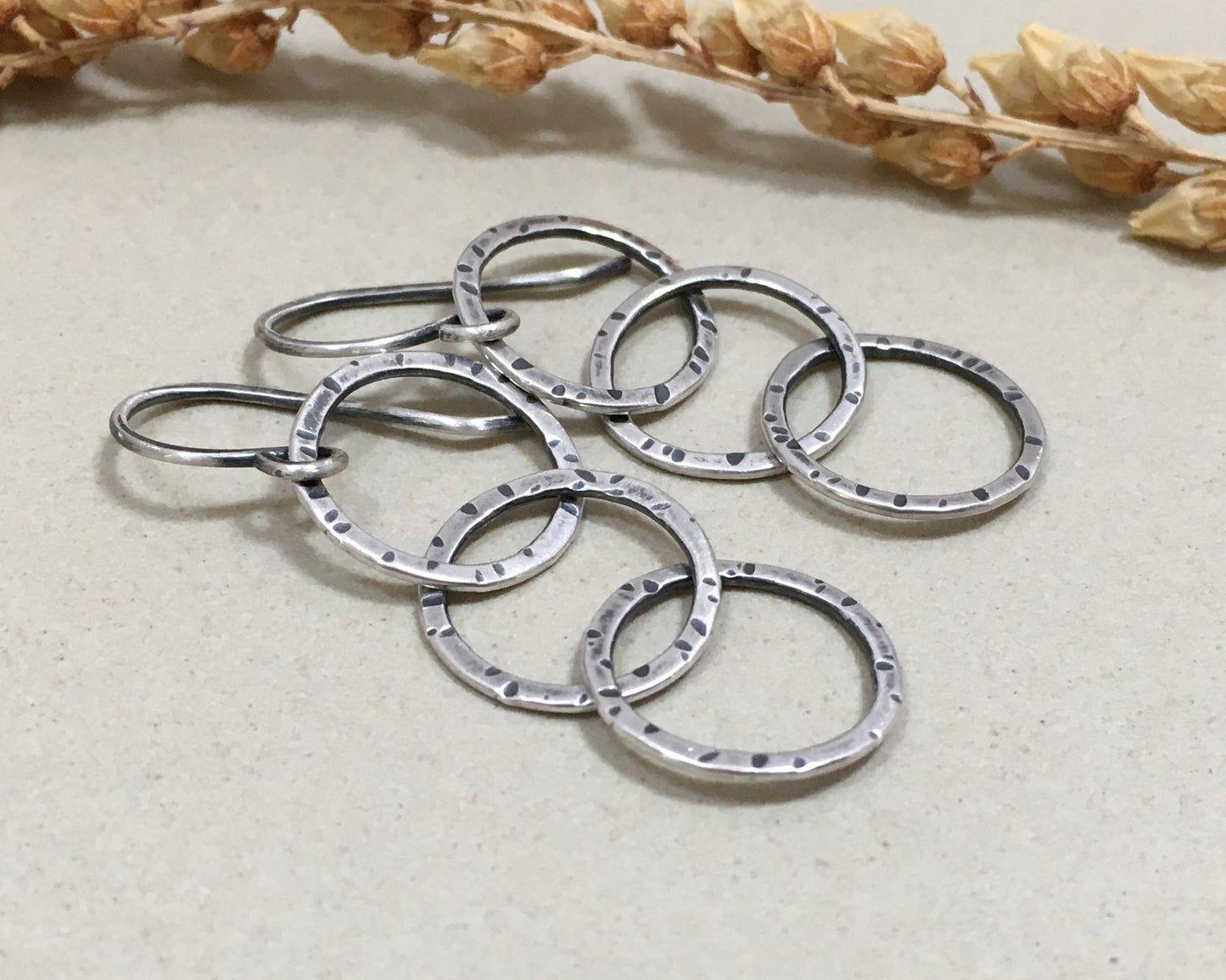 Triple linked textured hoops in oxidized sterling silver
