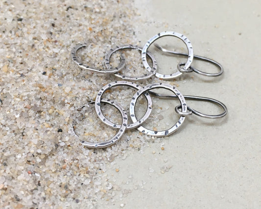 Triple linked textured hoops in oxidized sterling silver