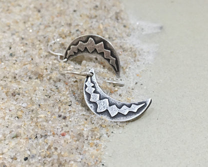 Silver crescent moon earrings with simple rustic design