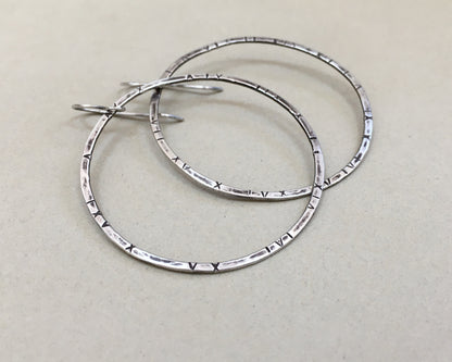 Large textured hoops in oxidized sterling silver