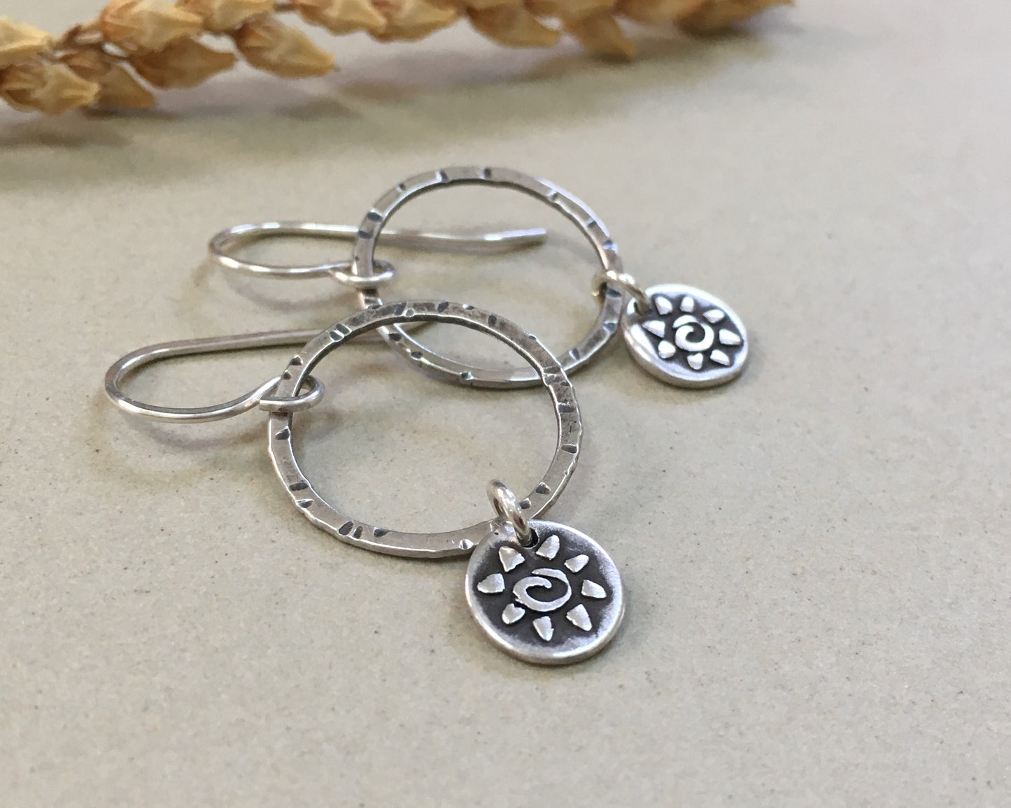 Small hoops with primitive sun dangles in oxidized sterling silver