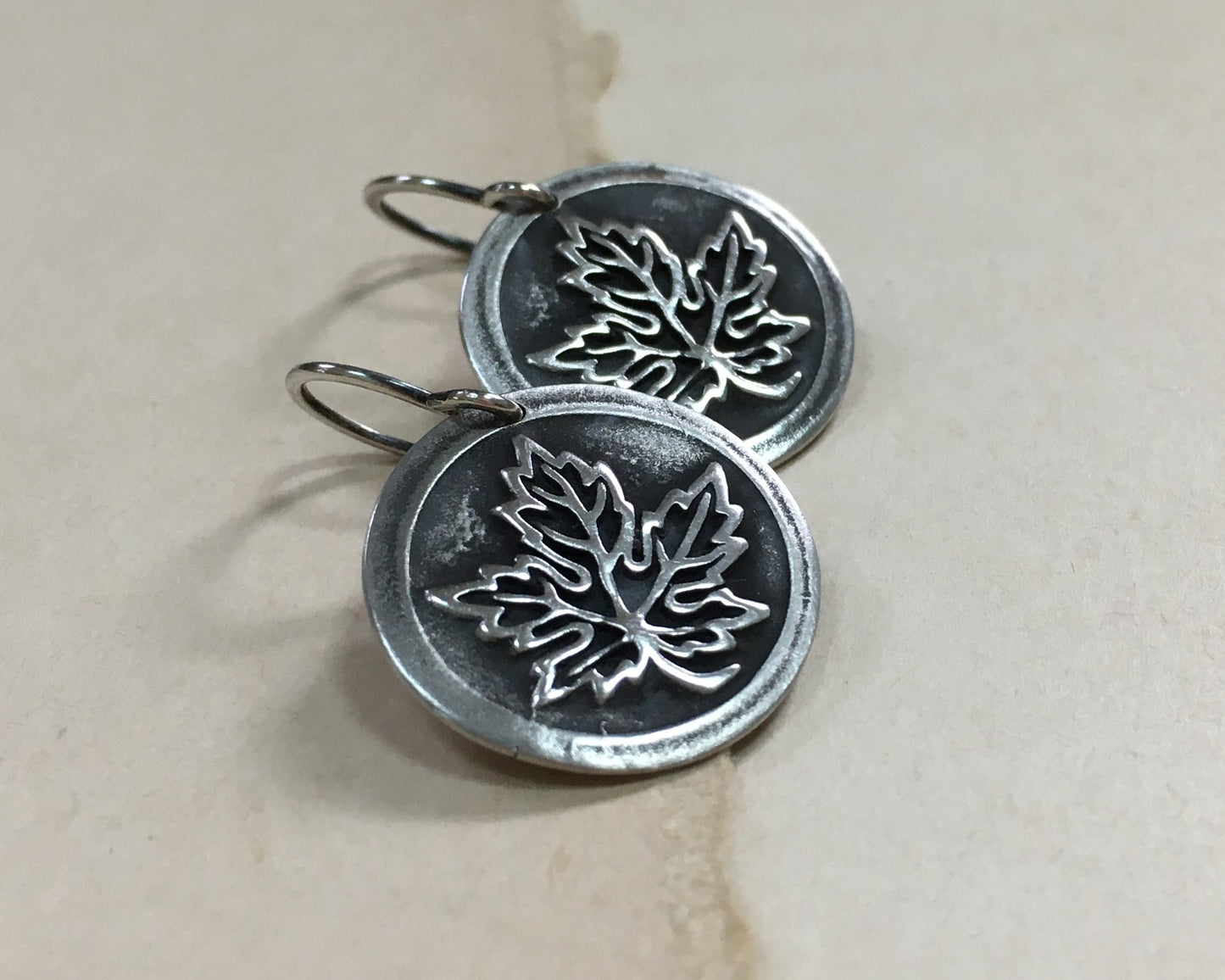 Maple leaf earrings in oxidized sterling silver - cast from vintage button