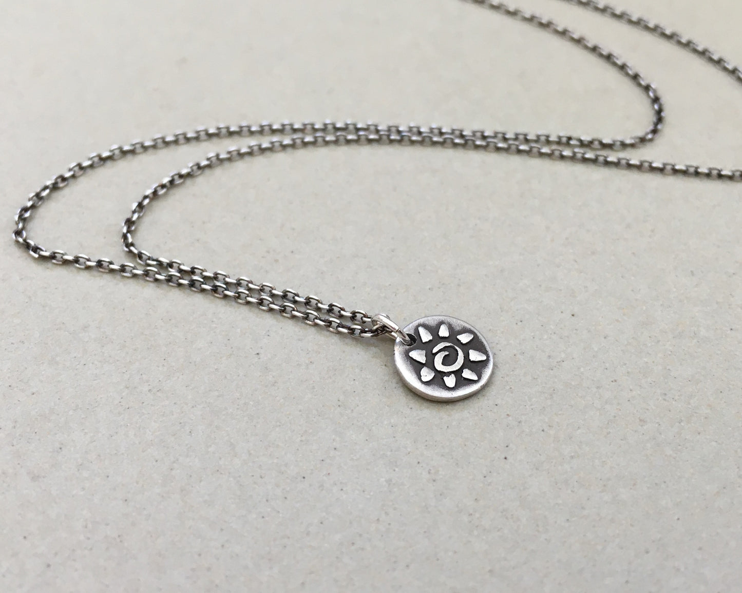 Tiny tribal style sun necklace in oxidized sterling silver