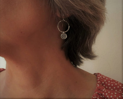 Small hoops with primitive sun dangles in oxidized sterling silver