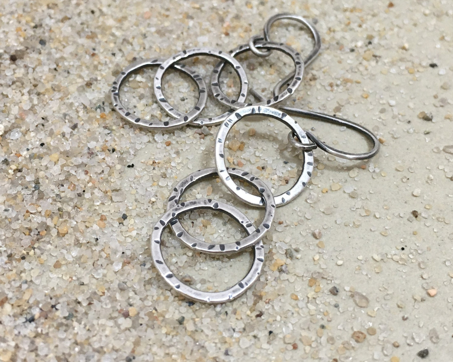 Triple linked textured hoops in oxidized sterling silver