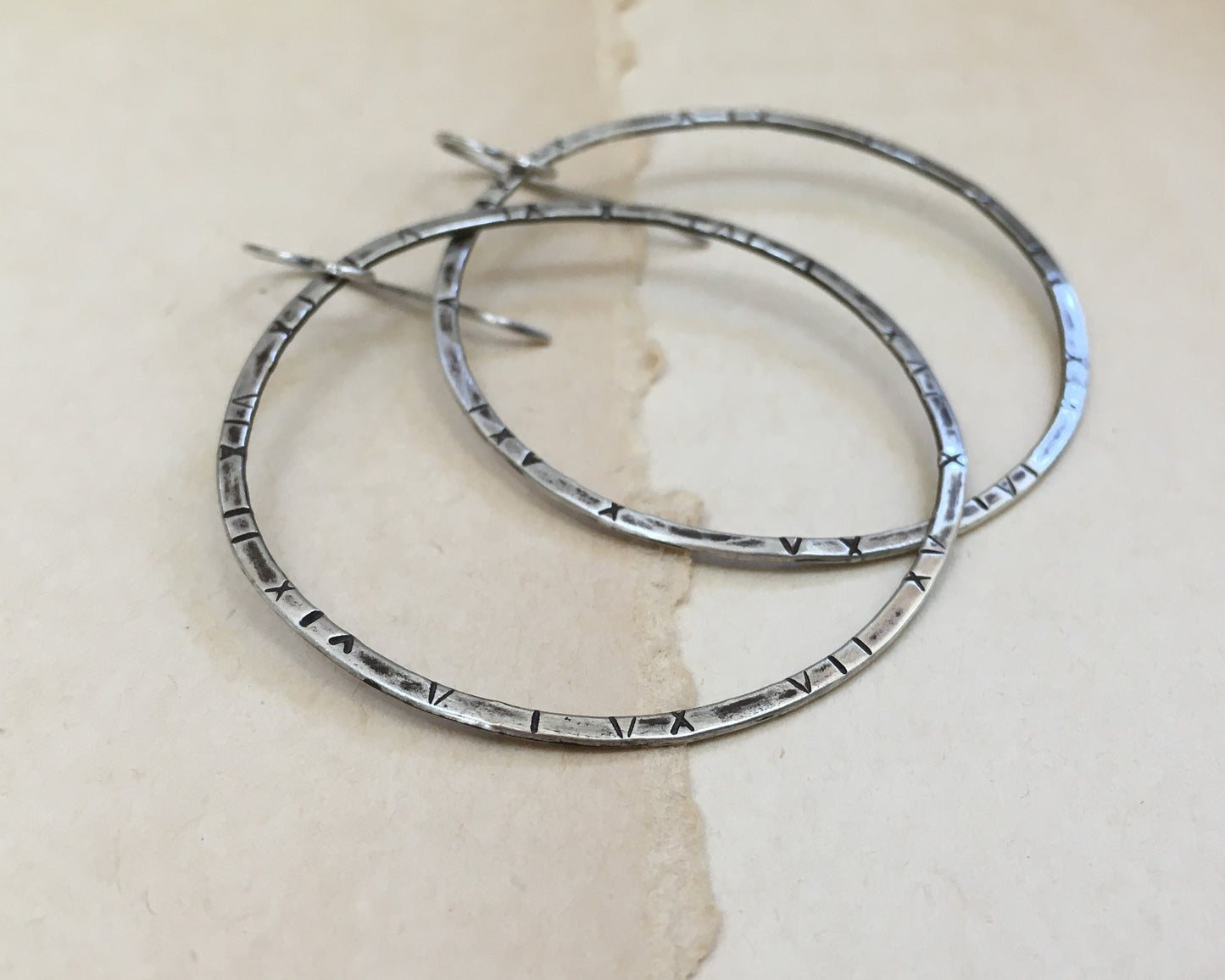Large textured hoops in oxidized sterling silver