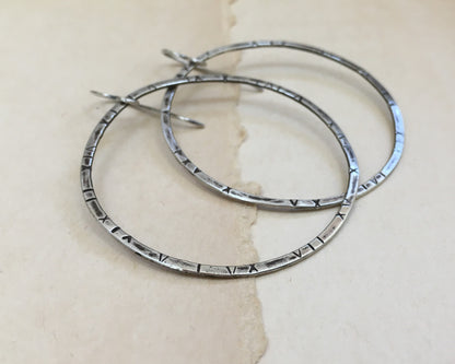 Large textured hoops in oxidized sterling silver