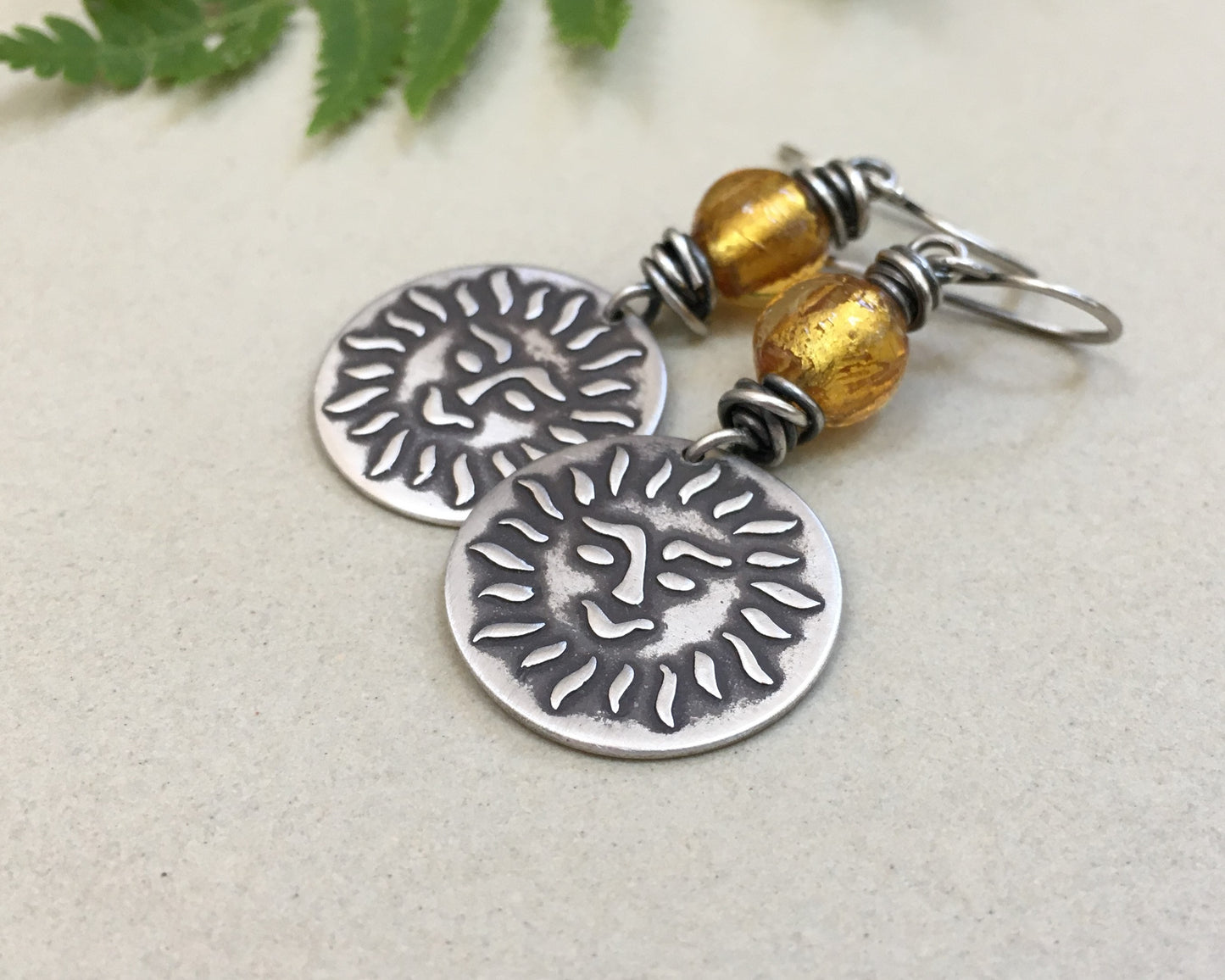 Happy sun face in oxidized sterling silver with gold foil bead