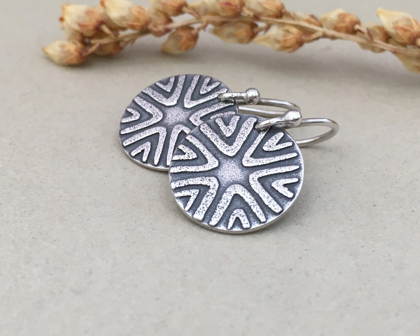 Primitive geometric discs in oxidized sterling silver