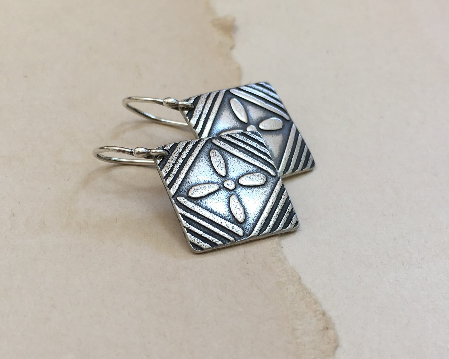 Flower and stripes earrings in oxidized sterling silver