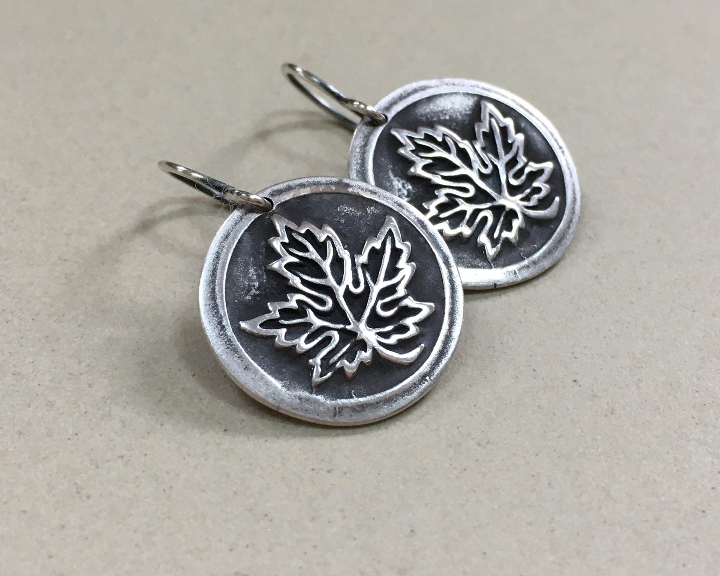 Maple leaf earrings in oxidized sterling silver - cast from vintage button