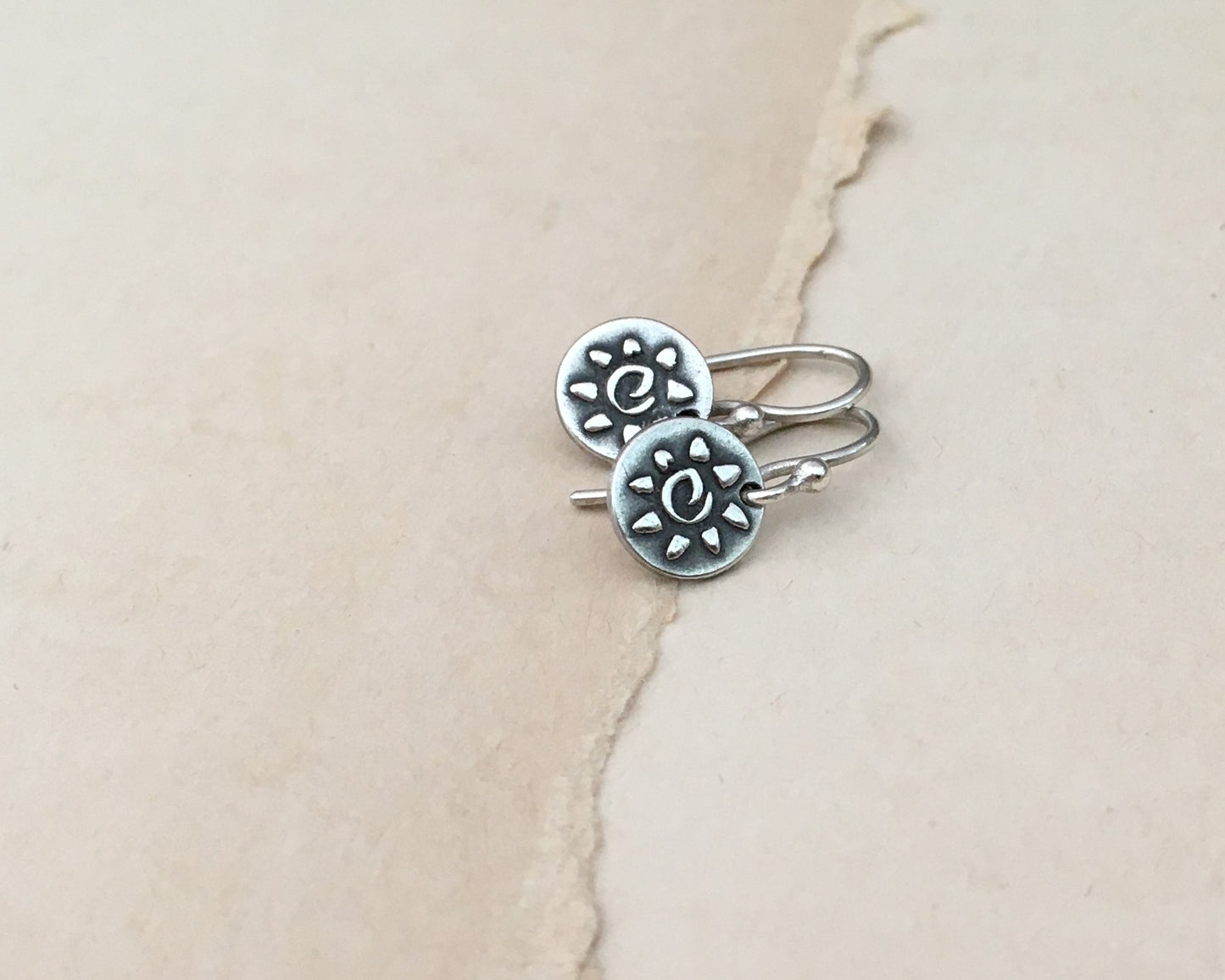 Tiny primitive sun earrings in oxidized sterling silver