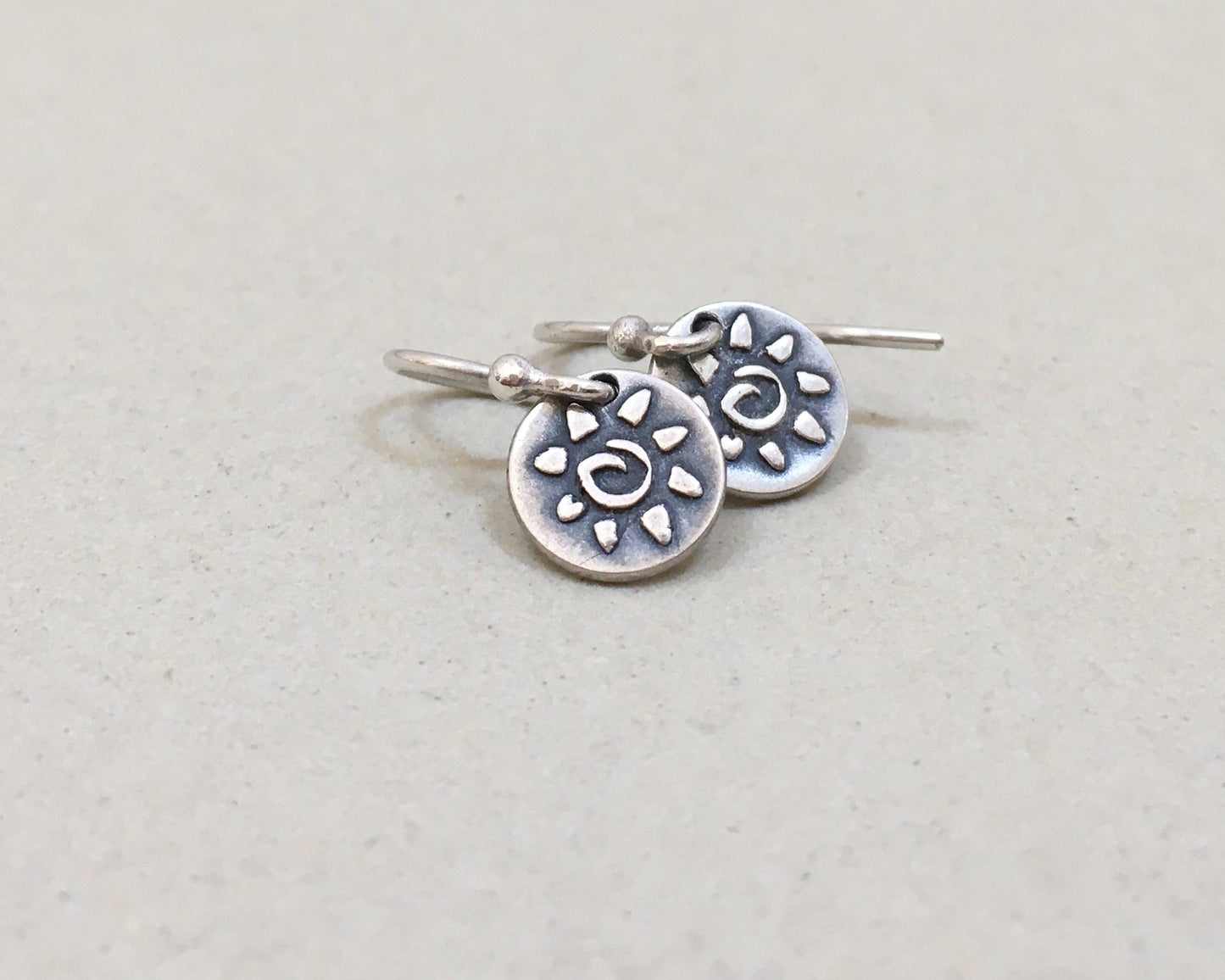 Tiny primitive sun earrings in oxidized sterling silver
