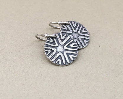 Primitive geometric discs in oxidized sterling silver