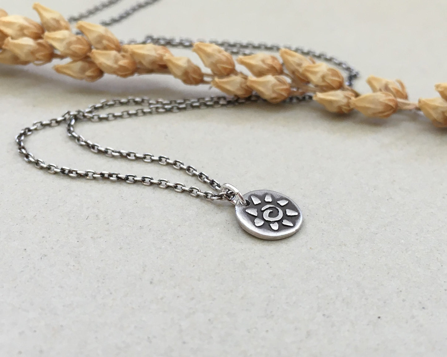 Tiny tribal style sun necklace in oxidized sterling silver