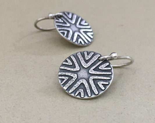 Primitive geometric discs in oxidized sterling silver